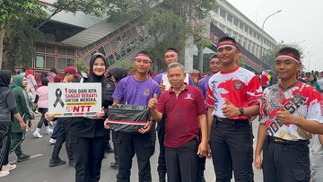 Brimob Sumsel Semarakkan HUT RI dengan Aksi Peduli dan Edukasi Publik di CFD Palembang